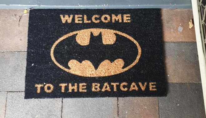 doormat that reads 'welcome to the batcave'