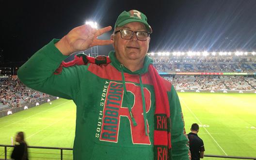 mike dressed in rabbitohs clothing at the stadium