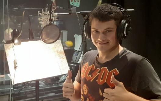 Dylan showing thumbs up in the recording studio